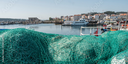 Fishing nets, panoramic view of the fishing port of o Grove, province of Pontevedra, Spain