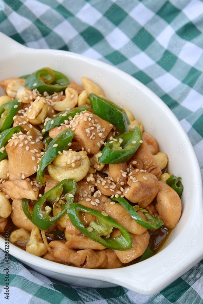 Stir-fried chicken with cashew nuts, green chili and sesame seeds Stir-fried chicken with cashew nuts, green chili and sesame seeds