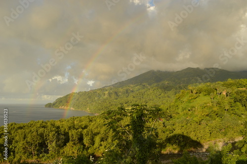 The lush jungle landscapes with waterfalls and black volcanic beaches on the St Vincent and Grenadines islands, Caribbean Ocean