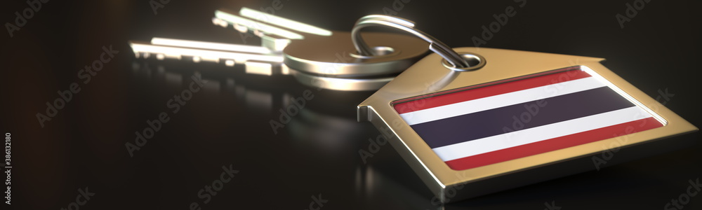 Flag of Thailand on the keychain with two keys. House rental or residence concepts, 3d rendering Flag of Thailand on the keychain with two keys. House rental or residence concepts, 3d rendering