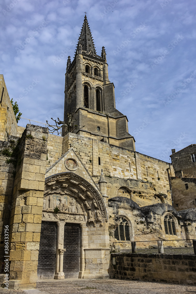 XII century Monolithic Church (Eglise Monolithe) with 68-meter bell tower in the center of town Saint Emilion. Monolithic Church - largest underground church in Europe. Saint Emilion, Gironde, France.