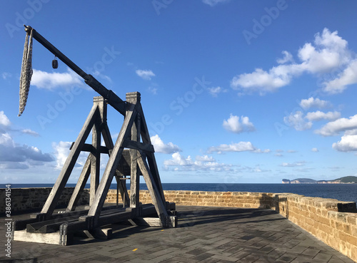 Print op canvas catapult on seafront bastions at alghero, sardinia, italy