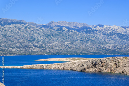 Adriatic Bay, mountains and croatian rocky coast near Pag Island, Mediterranean Sea, Croatia, landscape.