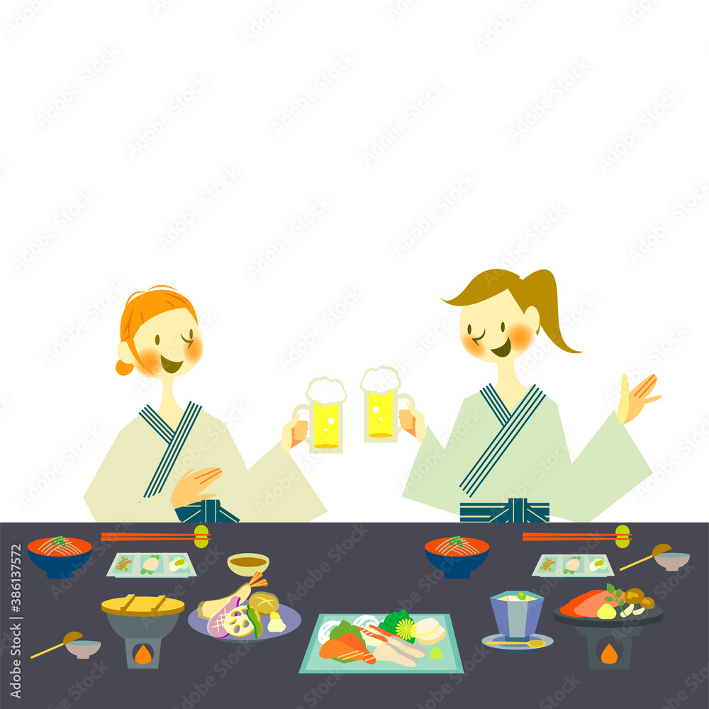 旅館で和食を楽しむ浴衣姿の女性ふたり 旅館で和食を楽しむ浴衣姿の女性ふたり