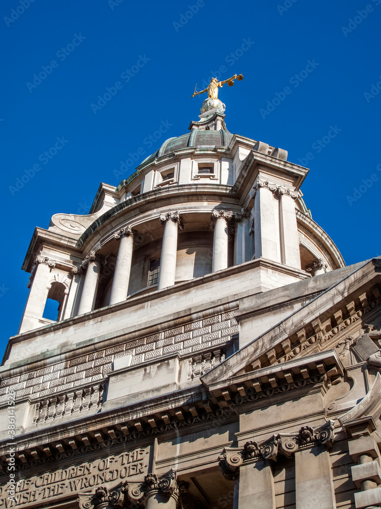 Scales of Justice of the Central Criminal Court fondly known as the Old Bailey London England, UK which dates from 1902 and is a popular travel destination tourist attraction landmark of the city