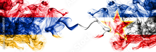 Obraz na plátně Armenia vs Yugoslavia, Yugoslavian smoky mystic flags placed side by side