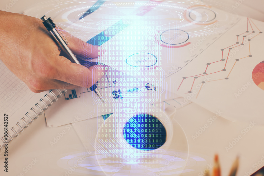 Writing man's hand with technology icons. Writing man's hand with technology icons.