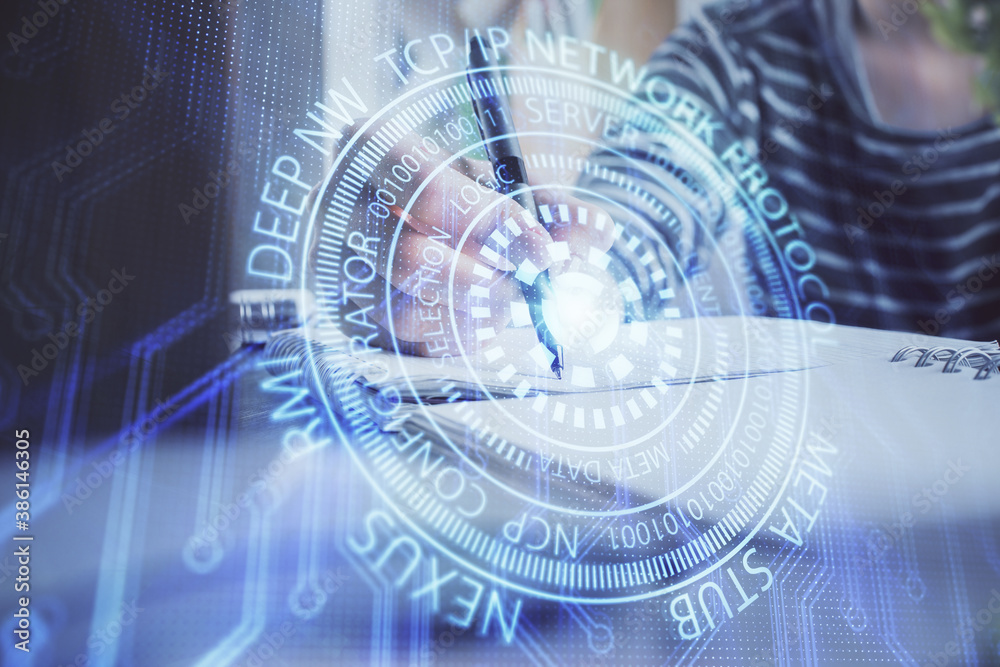 Obraz premium Double exposure of hands making notes with digital coding icons. Computer learning concept.