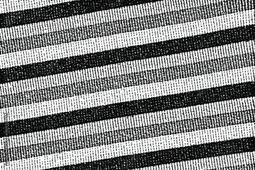 Grunge texture of striped knitwear. Monochrome fabric background with diagonal contrasting stripes. Overlay template. Vector illustration