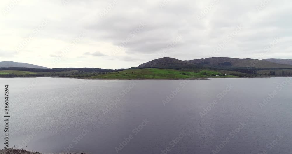 Aerial top view of Clatteringshaws Loch, Galloway Forest Park, Dumfries and Galloway, Scotland - United Kingdom Aerial top view of Clatteringshaws Loch, Galloway Forest Park, Dumfries and Galloway, Scotland - United Kingdom