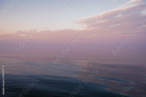 very calm and peaceful sunset at the baltic sea in the evening