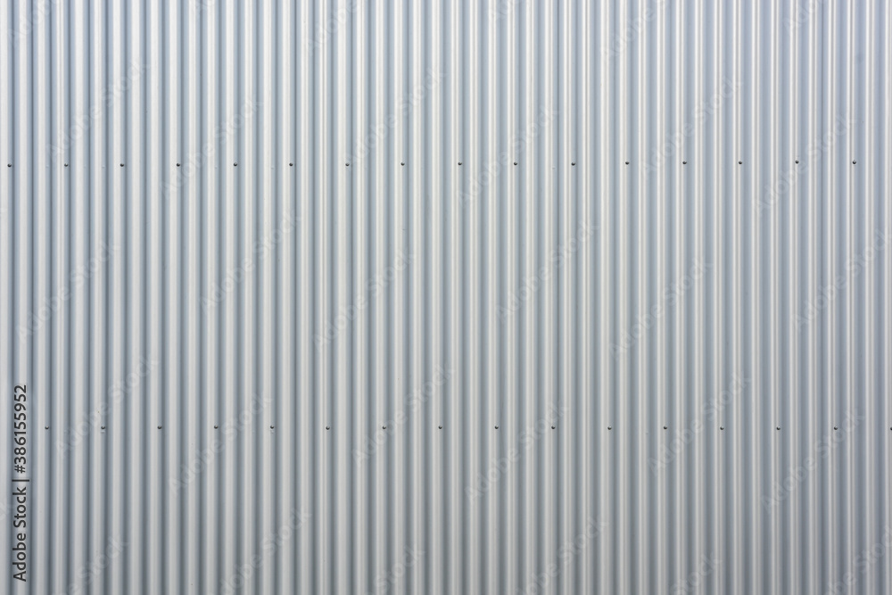texture of an aluminium wall and concrete wall of a warehouse texture of an aluminium wall and concrete wall of a warehouse