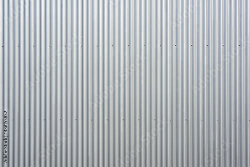 texture of an aluminium wall and concrete wall of a warehouse