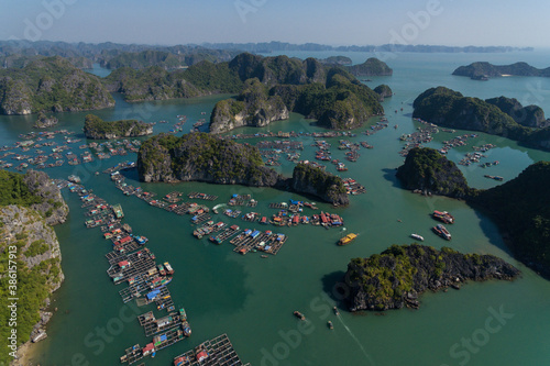 Floating Village on Ha Long Bay, Cat Ba Island, Vietnam, descending dragon bay Asia Aerial Drone Photo