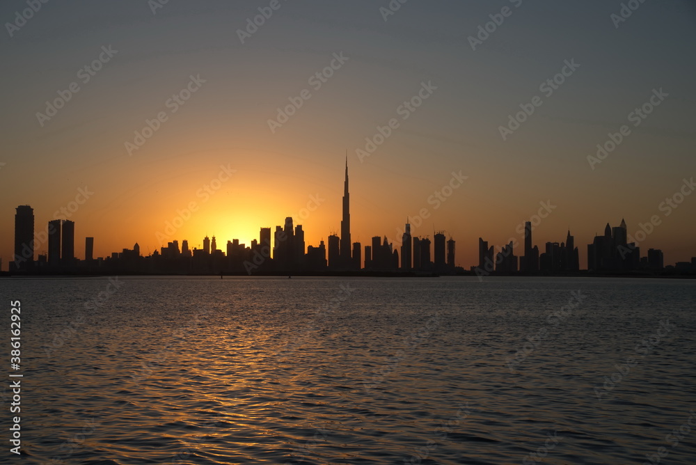 Dubai slyline from Dubai Creek Harbour and Dubai canal to Downtown and Business Bay, United Arab Emirates