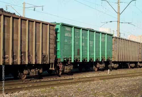 freight Cars in a moving freight train. Transportation by rail. Russia Krasnoyarsk, October 17, 2020