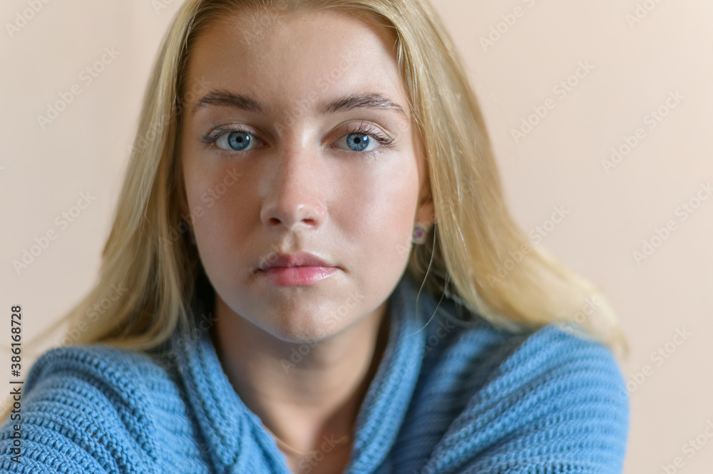 Portrait of beautiful sensual woman with blue eyes. Studio shot.