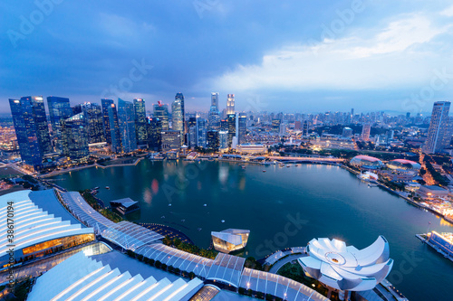 Marina bay with urban skyscrapers at night, Singapore 