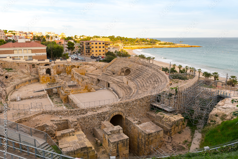 Sunny day in Tarragona Amphitheatre in Spain - A UNESCO World Heritage Site in summer.