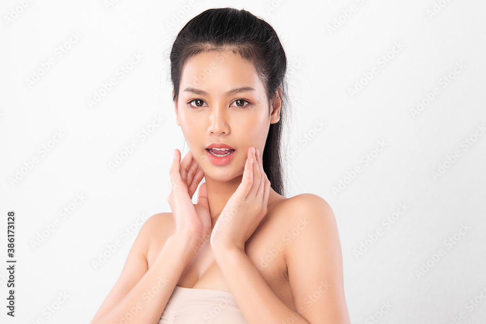 Beautiful young asian woman with clean fresh skin on white background, Face care, Facial treatment, Cosmetology, beauty and spa, Asian women portrait Beautiful young asian woman with clean fresh skin on white background, Face care, Facial treatment, Cosmetology, beauty and spa, Asian women portrait