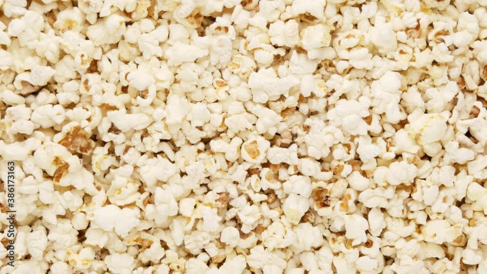 Pop corn - background. Cheese popcorn, dolly shot.