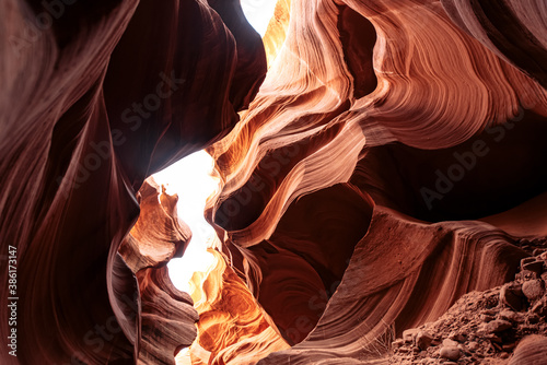 Startling wide angle view of rock formations in incredible Antelope Canyon, Arizona, USA. Bizarre rocks and a crack between