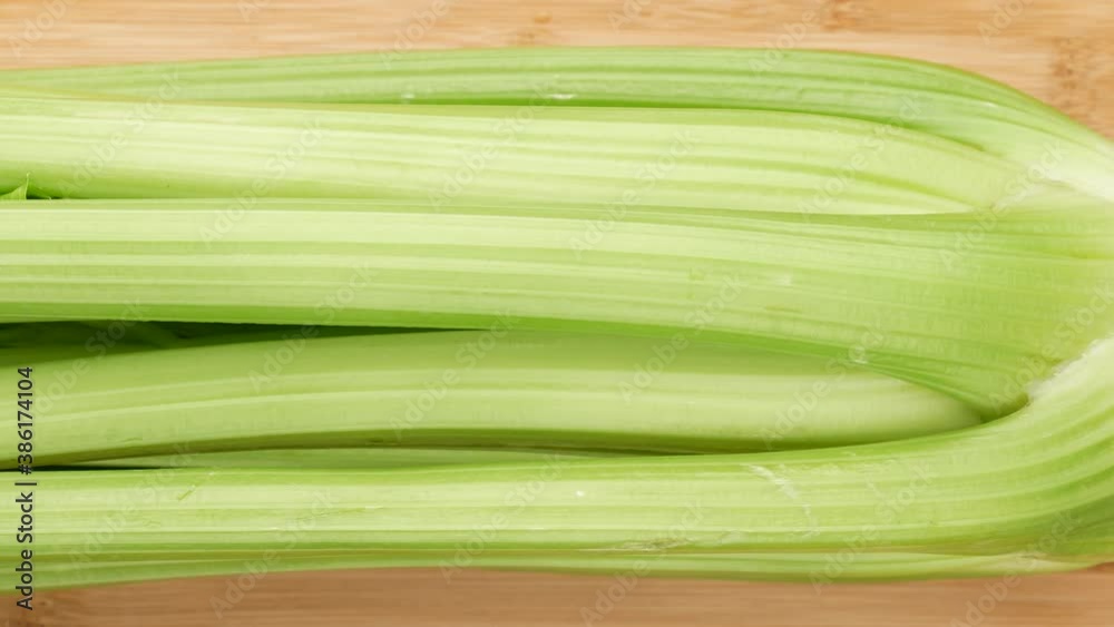 Celery on the kitchen board, dolly shot.