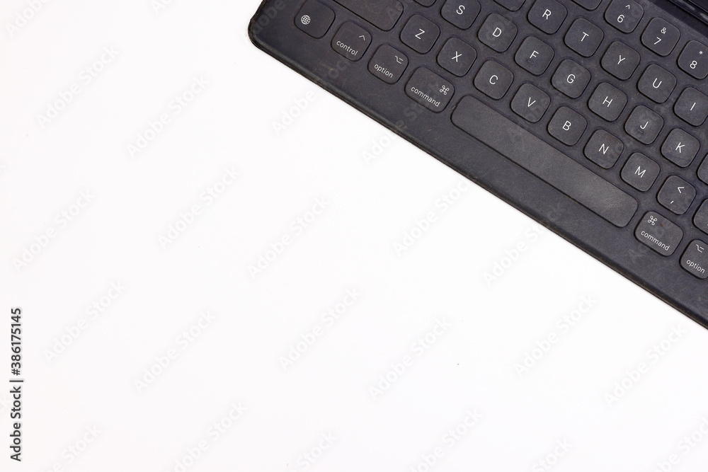 Black computer keyboard on white background top view copy text space