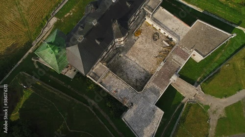 Architecture of the historic building of Pidhirtsi Castle. Bird view. Evening summer light. Ukraine. photo