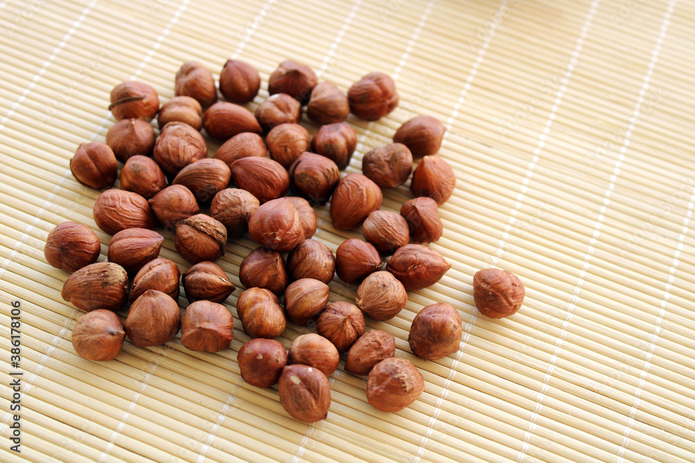 hazelnuts on a wooden background hazelnuts on a wooden background