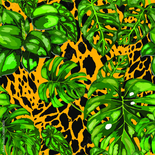 Tropical seamless pattern on animalistic texture. Jungle exotic summer print. Summer tropical leaf. Tropical flower fashion pattern. Floral tropic illustration. Vector seamless pattern.