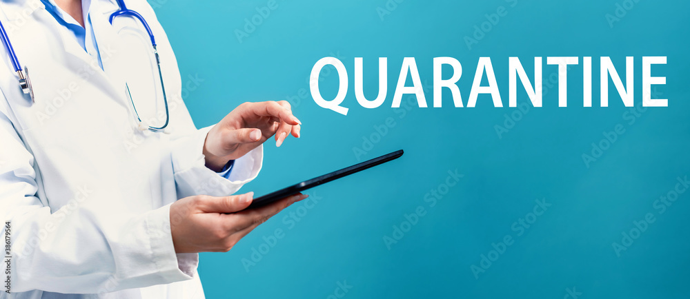Quarantine Coronavirus theme with a doctor using a tablet computer Quarantine Coronavirus theme with a doctor using a tablet computer