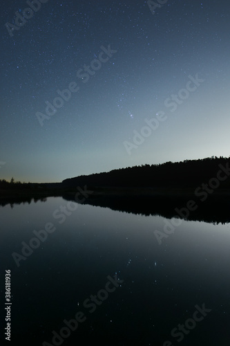 Orion over the forest pond