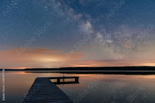 Milky Way over a lake pier