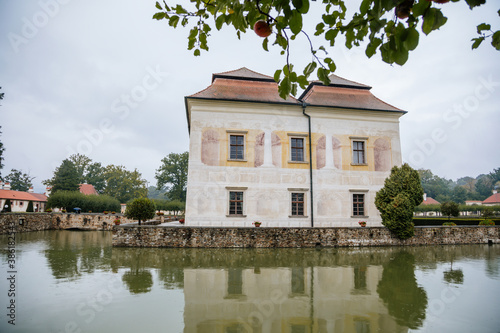 State Chateau Kratochvile, Renaissance residence in watercolor style surrounded by a park and water moat located in South Bohemia, Czech Republic photo