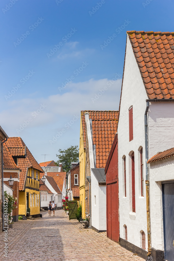 Colorful street with historic houses in Ribe, Denmark