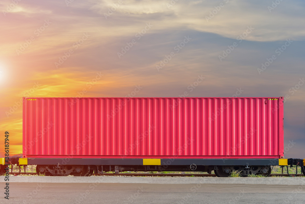 Freight Train with Cargo Containers, Transport, Shipping import Export on sunset sky background