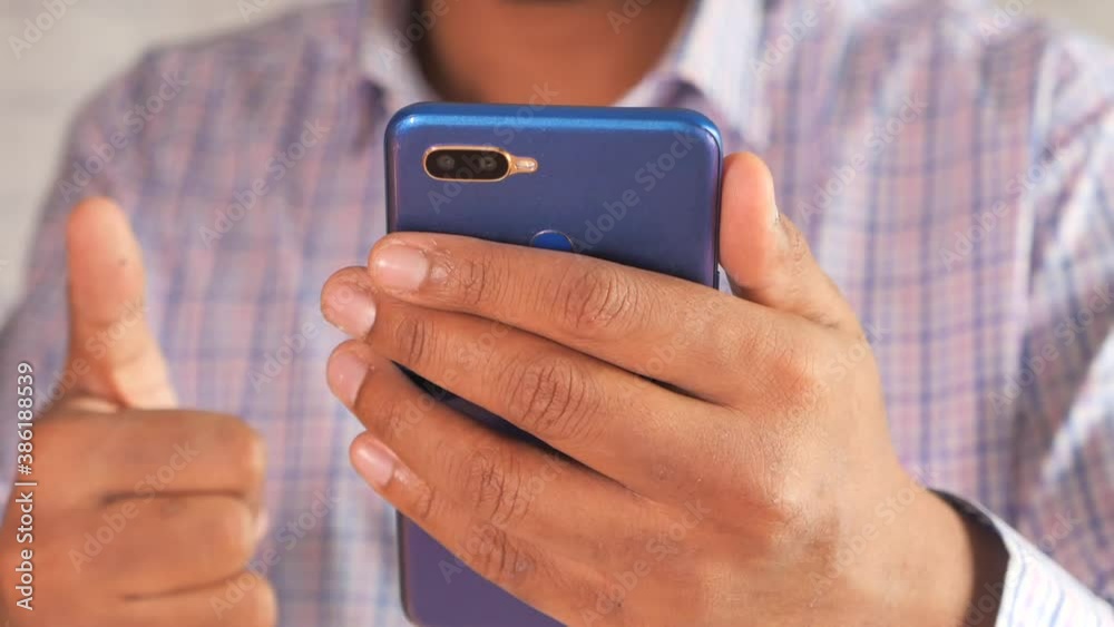 doctor in white coat using a smartphone. doctor in white coat using a smartphone.