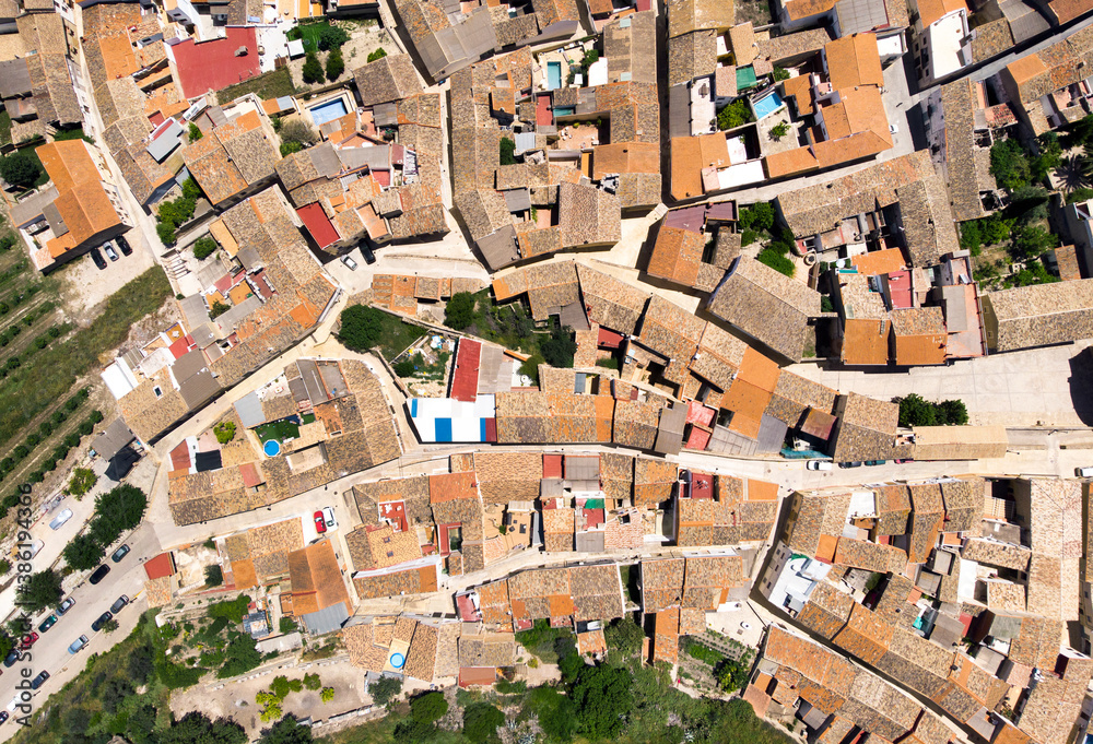 Directly from above view ancient houses rooftops and roads, view from top. Montesa village. Spain