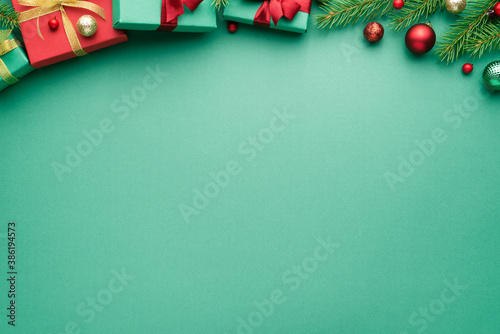 Christmas or New Year turquoise background with fir decor