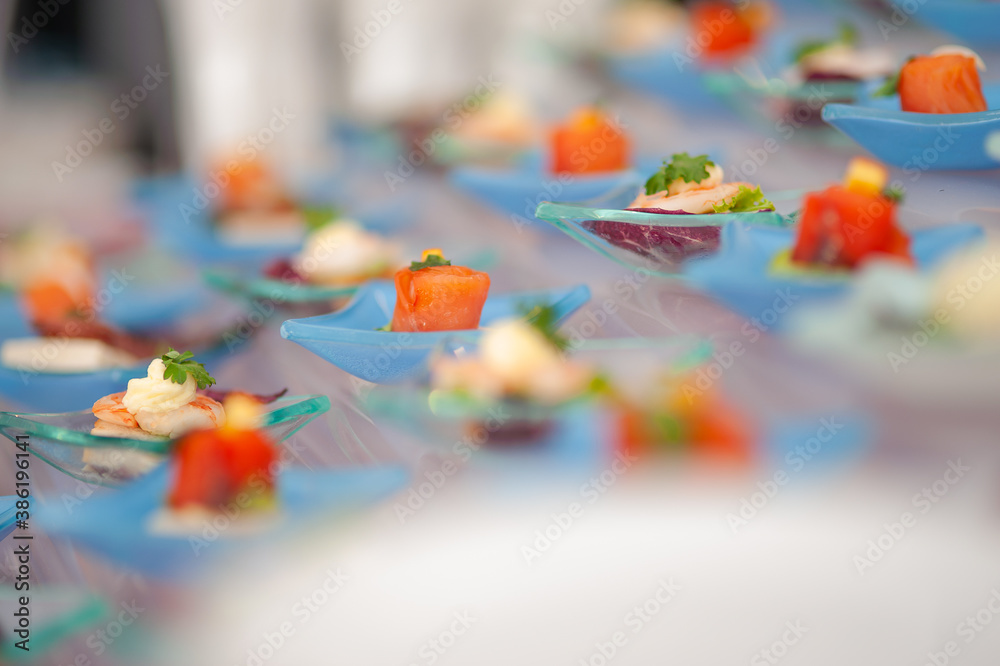 assorted canapes on slate platter assorted canapes on slate platter