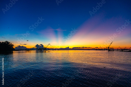 Chinese fish nets during sunrise in Phatthalung province, Thailand © StefanoBeber