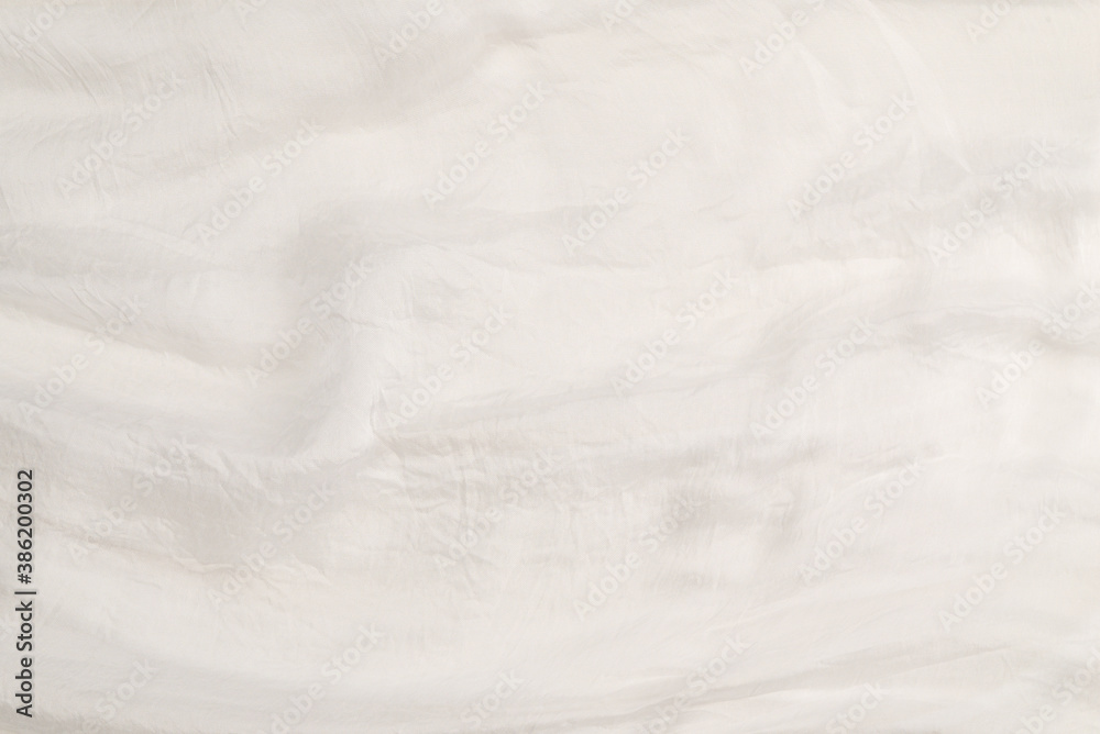 Obraz premium Soft smooth white silk fabric background. Fabric texture.
