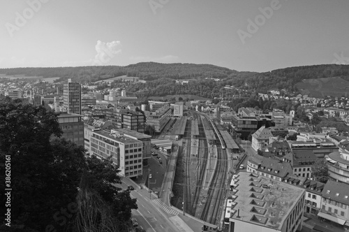 Switzerland: The view to the train station of the old town of Baden City and the industrial zone in canton Aargau