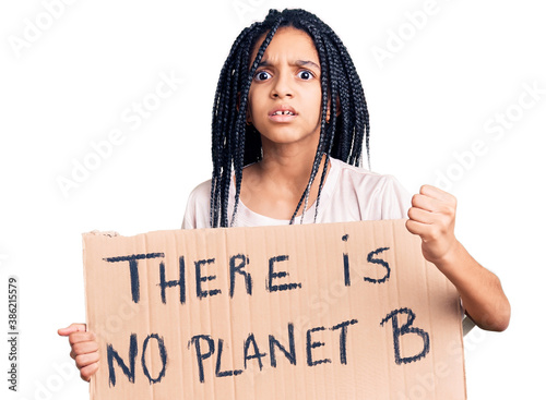Wallpaper Mural Cute african american girl holding there is no planet b banner annoyed and frustrated shouting with anger, yelling crazy with anger and hand raised Torontodigital.ca