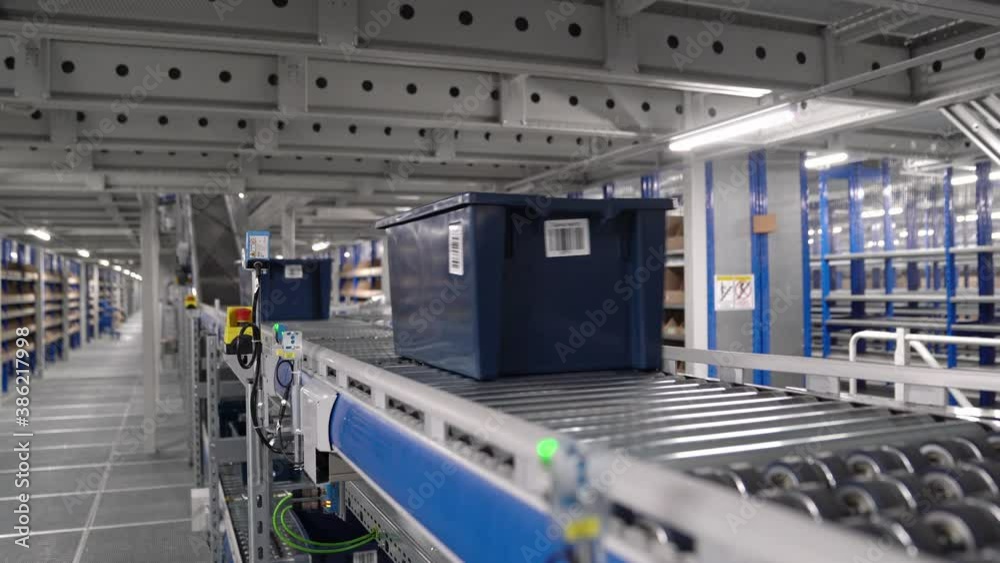 working conveyor belt in warehouse of online store. system for picking orders working conveyor belt in warehouse of online store. system for picking orders