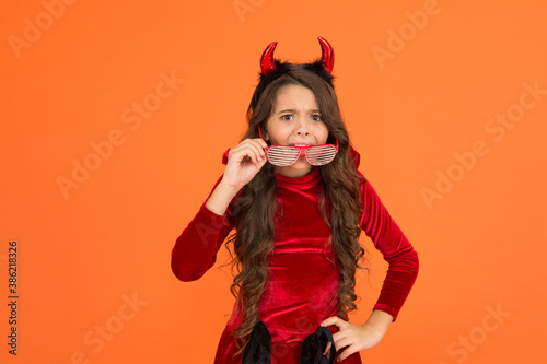 no way. teen girl ready to celebrate costume party. be in trend. happy halloween. smiling child in devil horns. kid wear funny party glasses. just having fun. childhood happiness