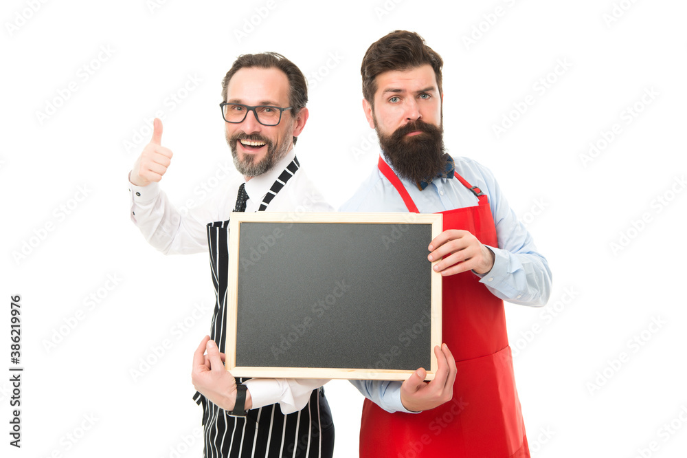 Time for healthy snack. menu planning. happy chef team in apron. partners celebrate start up. catering business. welcome on board. bearded men with blackboard, copy space. cafe and restaurant opening Time for healthy snack. menu planning. happy chef team in apron. partners celebrate start up. catering business. welcome on board. bearded men with blackboard, copy space. cafe and restaurant opening