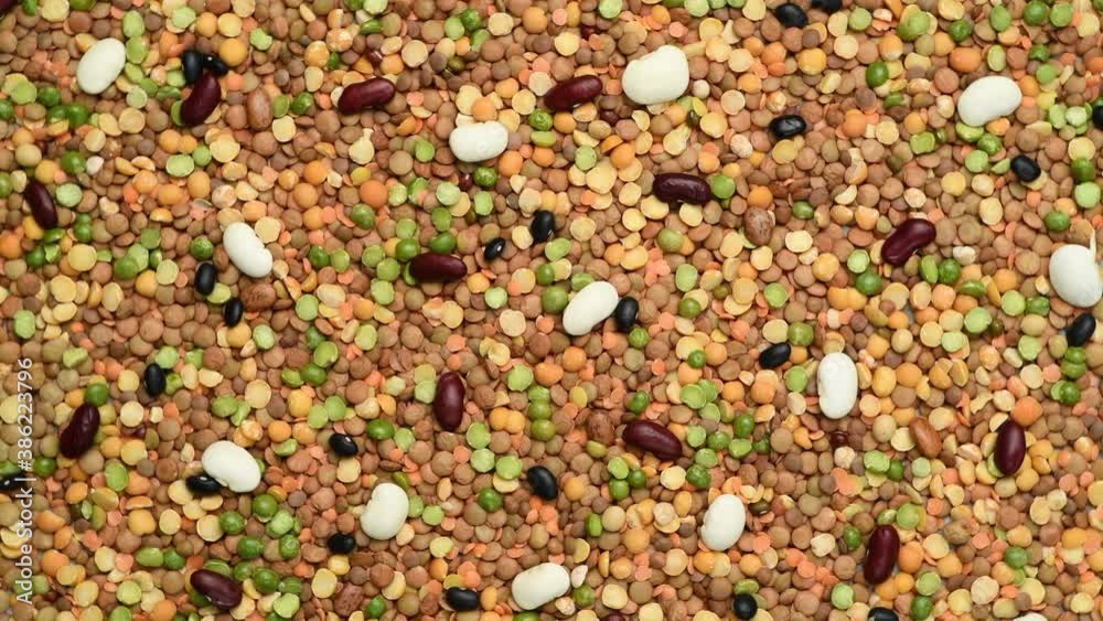 Legumes such as lentils and beans assortment, top view, rotating Legumes such as lentils and beans assortment, top view, rotating