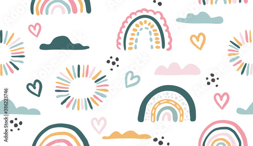 Seamless vector pattern with hand drawn rainbows and sun